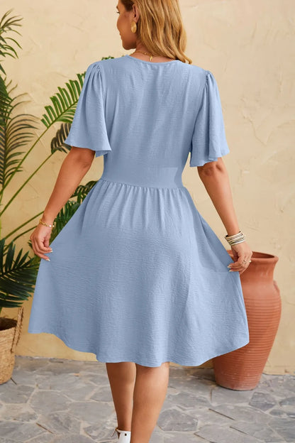 V-neck cinched waist flared sleeve fashionable dress