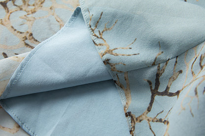 Elegant Silk Maxi Dress with Fashionable Prints