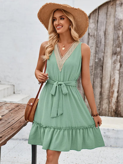 Solid color V-neck sleeveless lace cinched waist dress