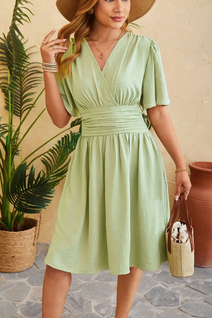V-neck cinched waist flared sleeve fashionable dress